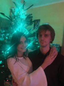Alicia and Phillip in front of the Christmas Tree