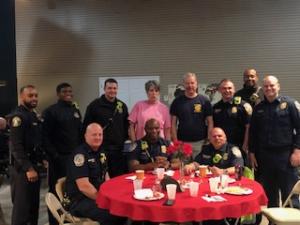 First responders at table in sanctuary