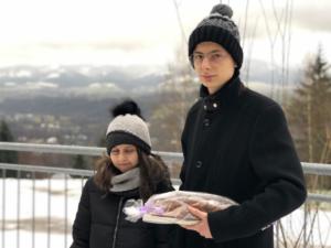 Kulek children taking bread