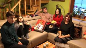 Mirek's family opening Christmas presents