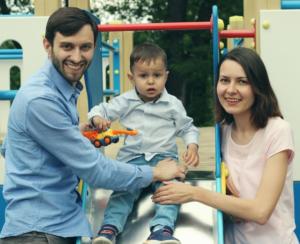 Tolik, Alyona and Roman on slide.
