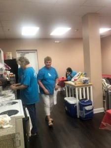 VBS Denise and Kay in kitchen preparing food 4