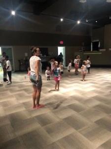 VBS teachers and children in sanctuary playing game 6