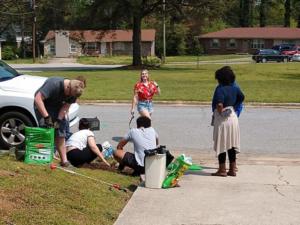 Youth Cleanup in driveway