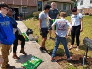 Youth Cleanup in front of house